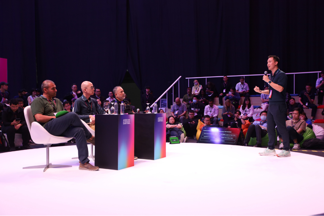 AI founder is on stage pitching to a panel of venture capitalists and a live audience