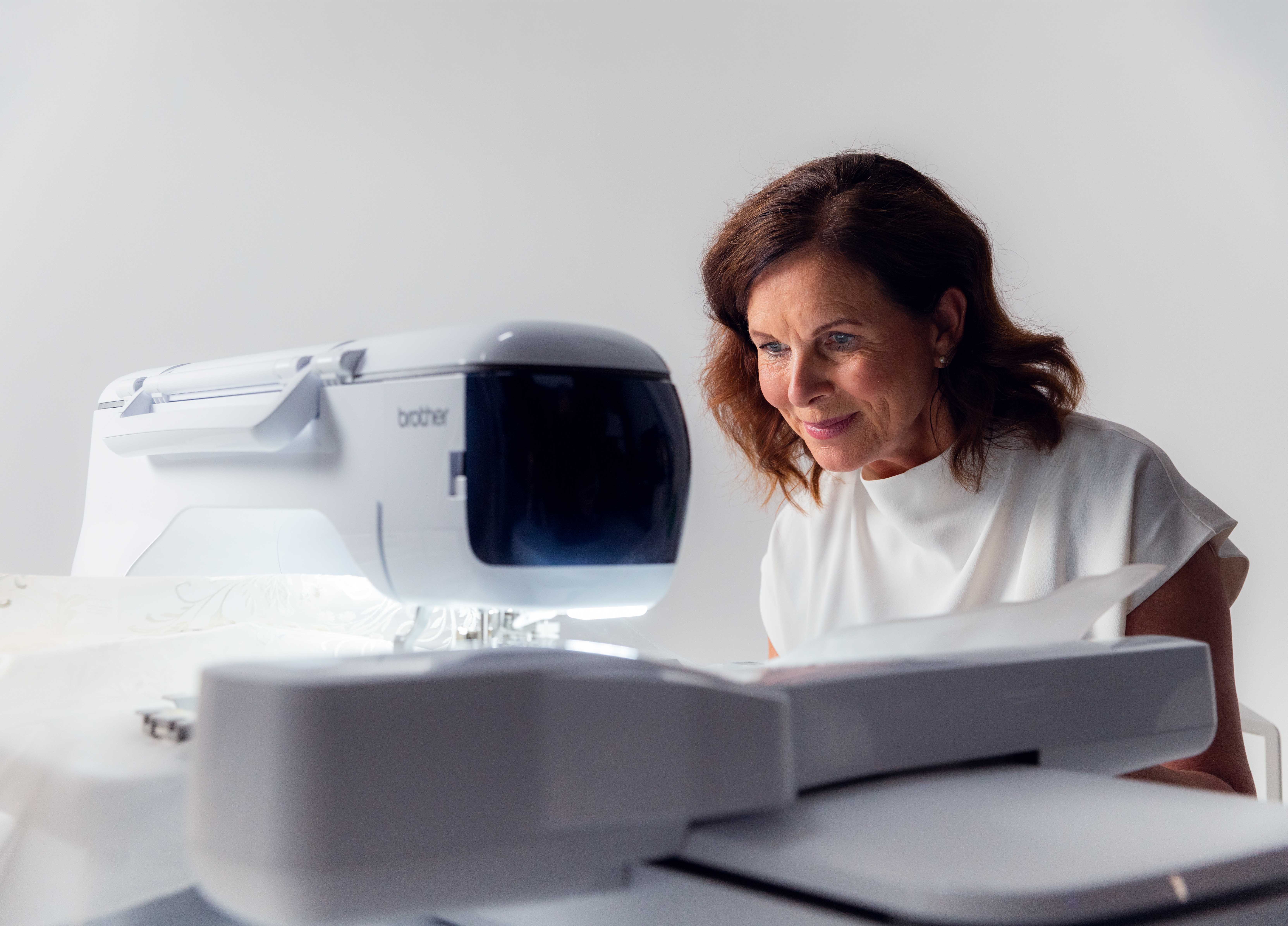 Model using the Brother Aveneer machine during a product film shoot