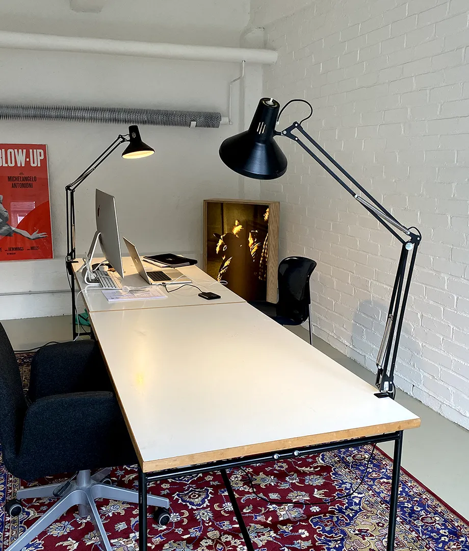 A cramped office space inside a garage.