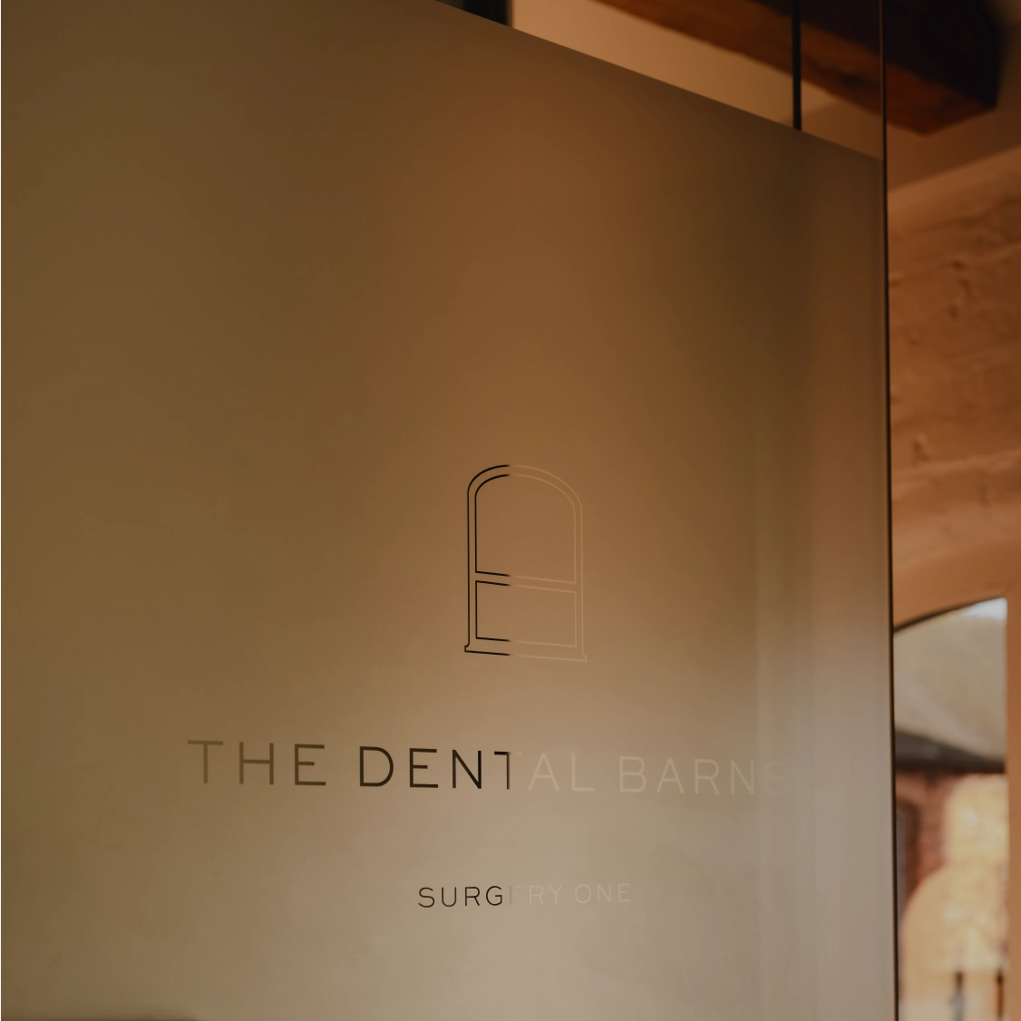 The elegant Surgery One branding at The Dental Barns Lichfield, a luxury cosmetic practice providing Invisalign, composite bonding, and porcelain veneers near Sutton Coldfield.