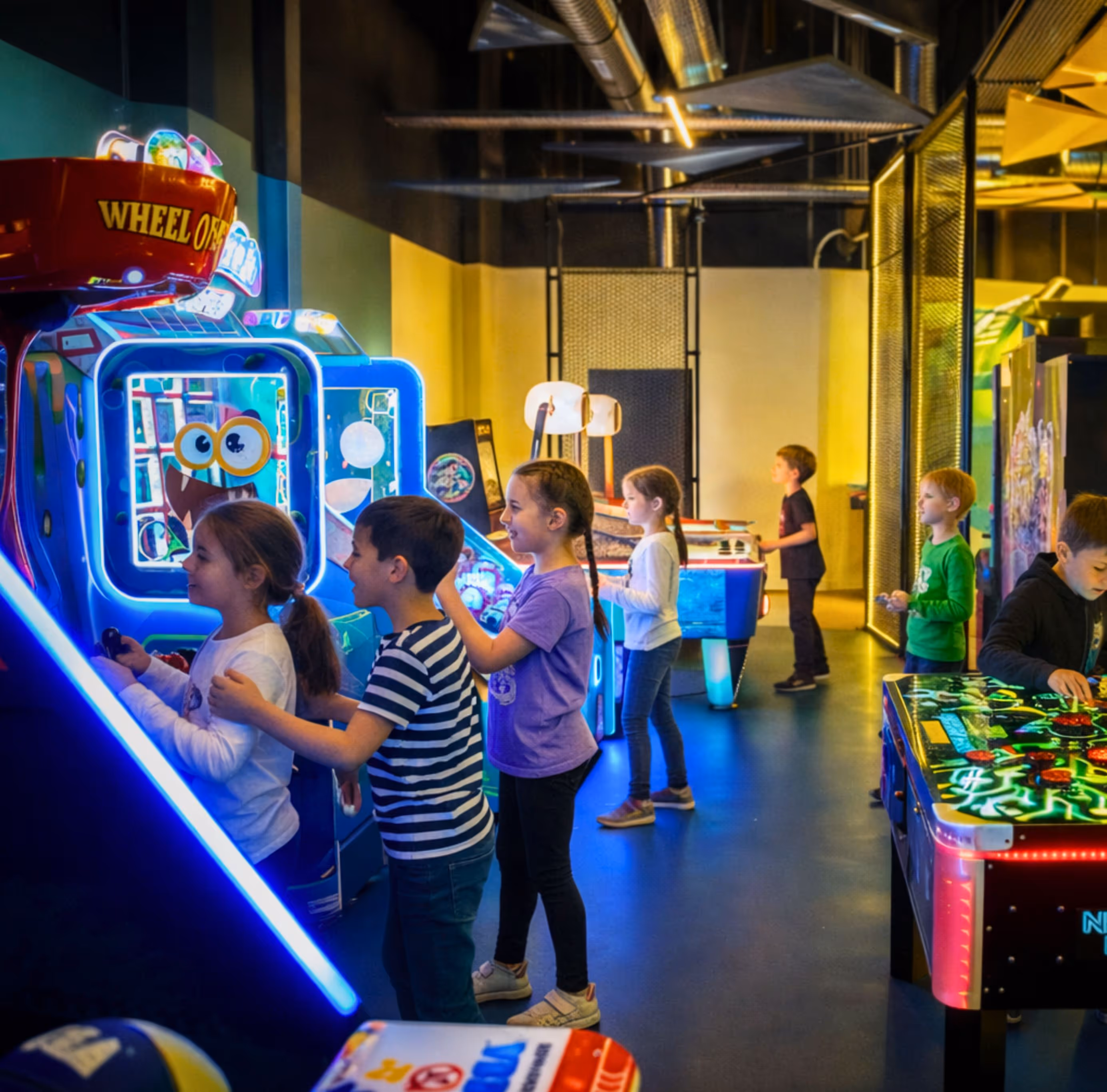 kids playing arcade games