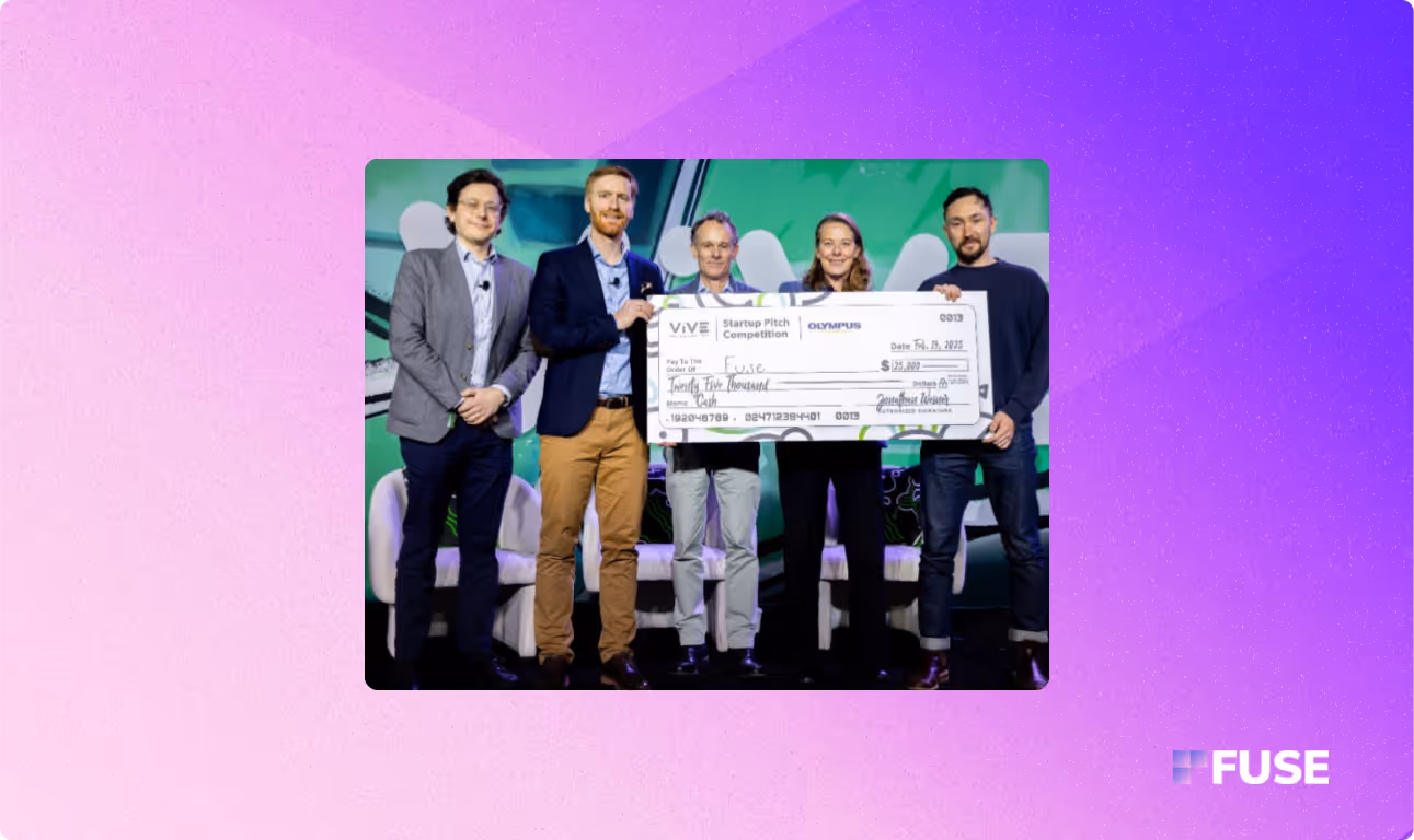 A photograph of Fuse co-founder Sho and ViVE 2025 judges holding the pitch competition winner's check
