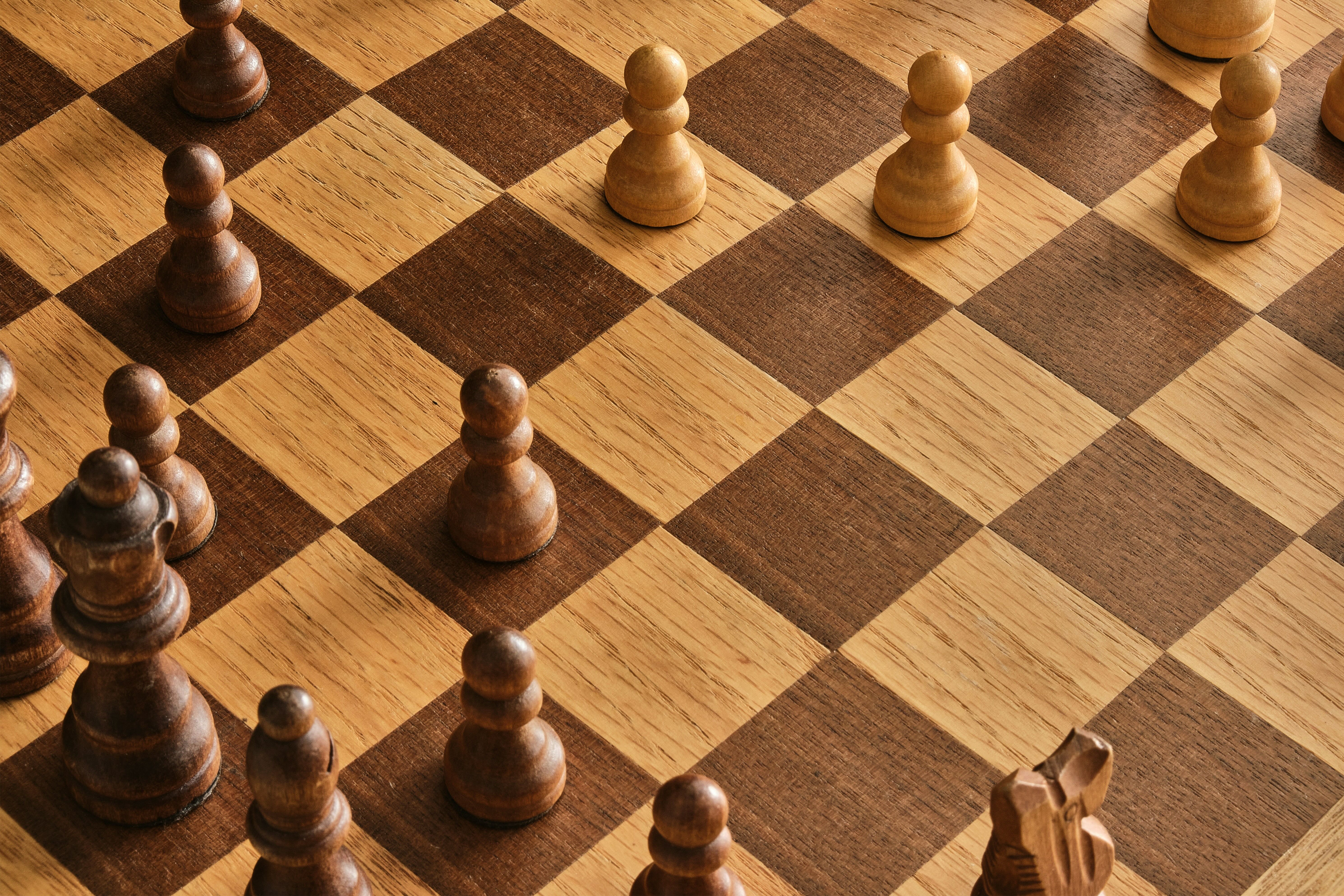 chess pieces on a board representing competitive price monitoring strategy for retail