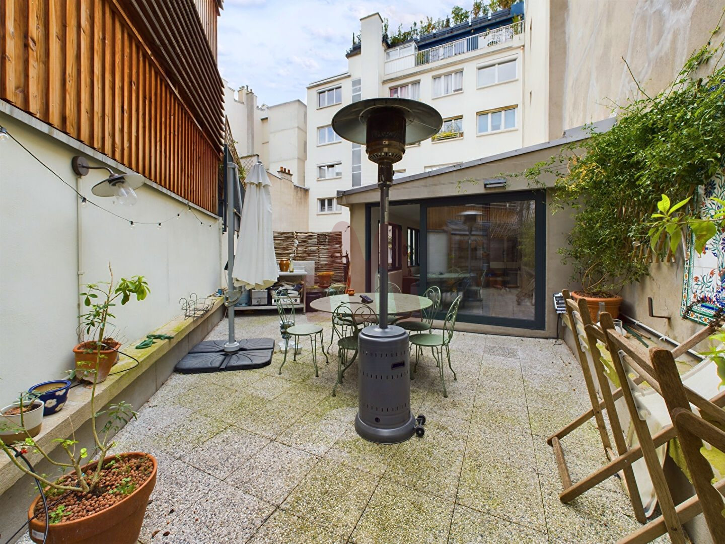 Élégant 2 pièces de 63m2 avec terrasse de 40m2 à Paris 18eme