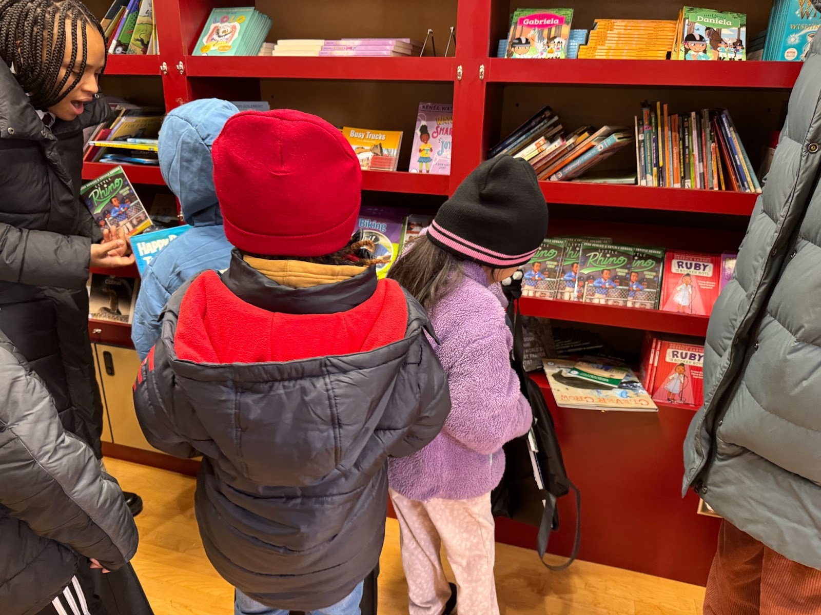 Children finding great reads on the Cavs Book Bus!