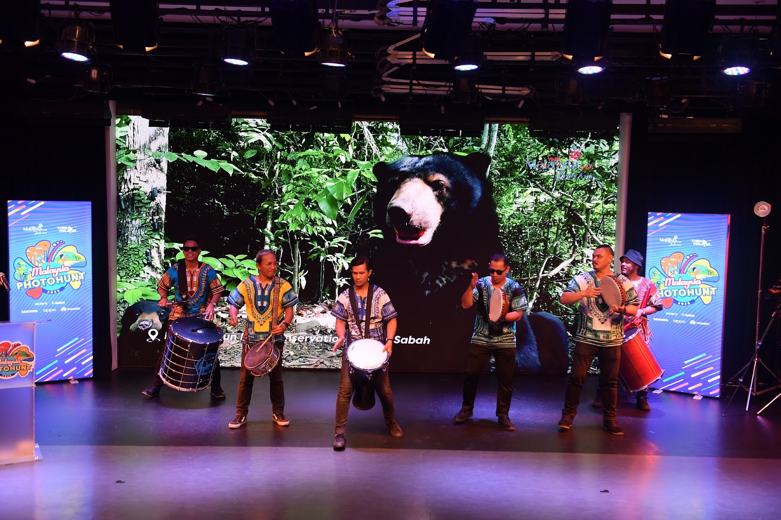 Six people are performing on the stage