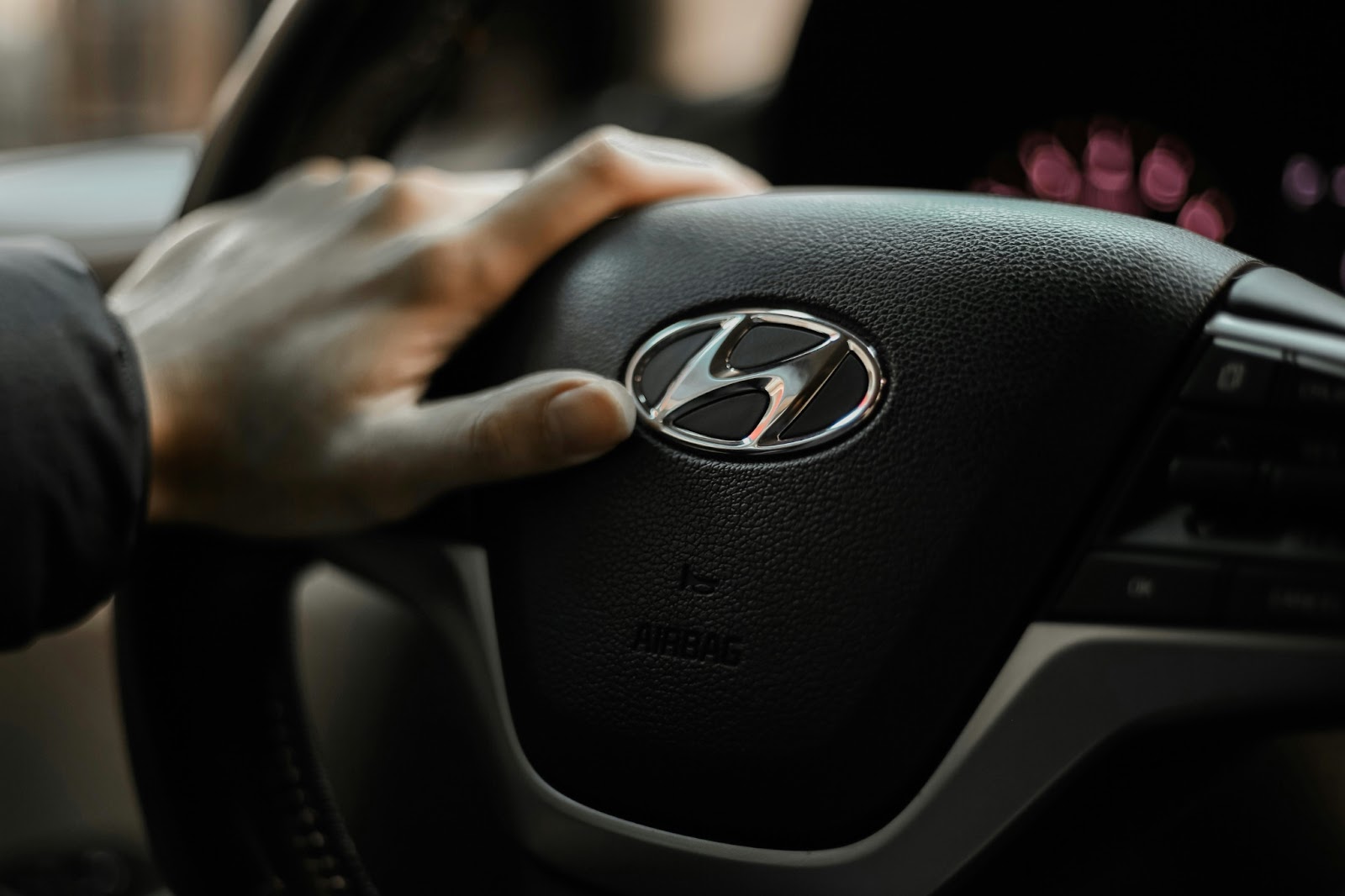 People driving a Hyundai car