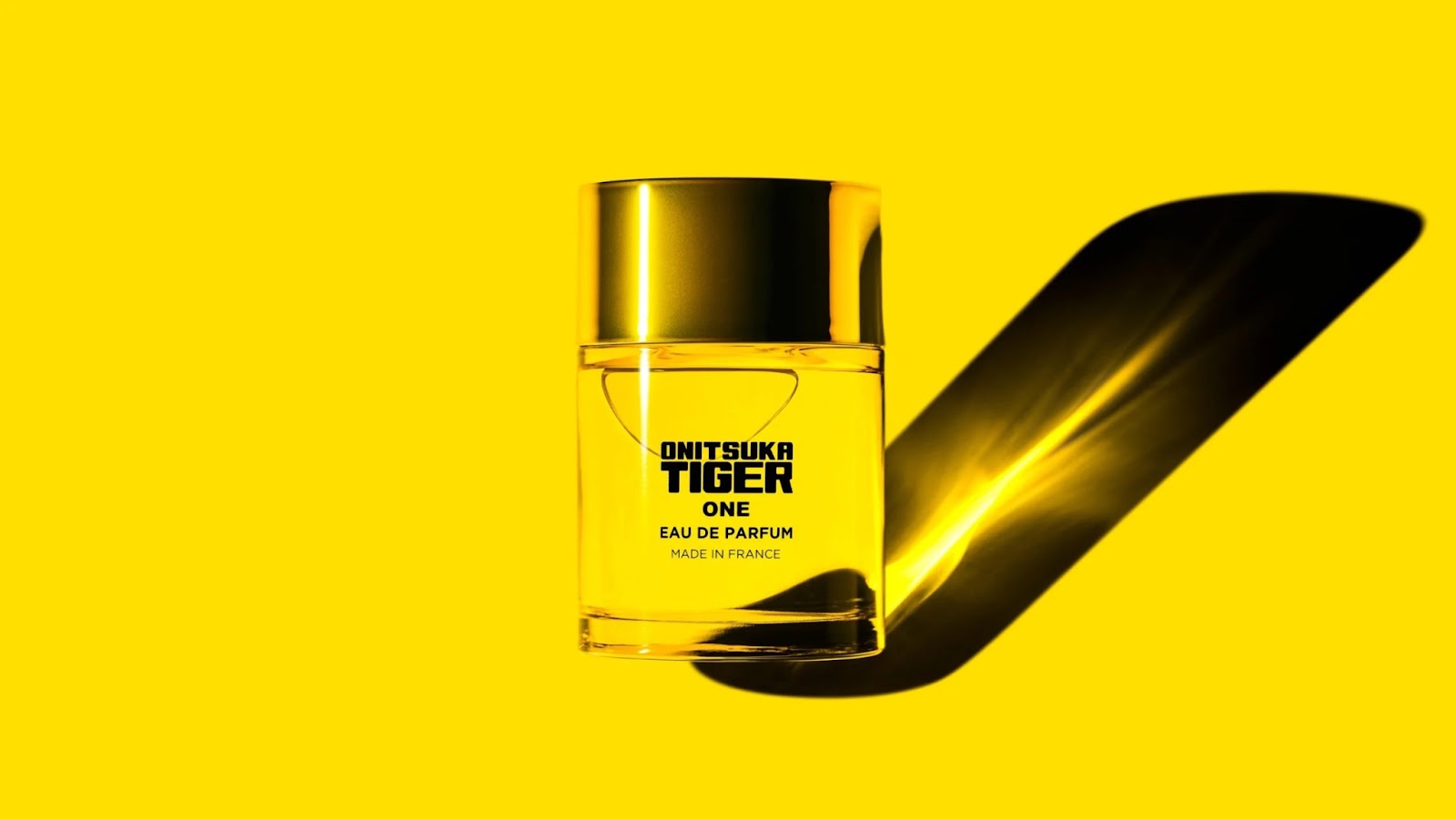 A EDP in yellow bottle which is from onitsuka tiger