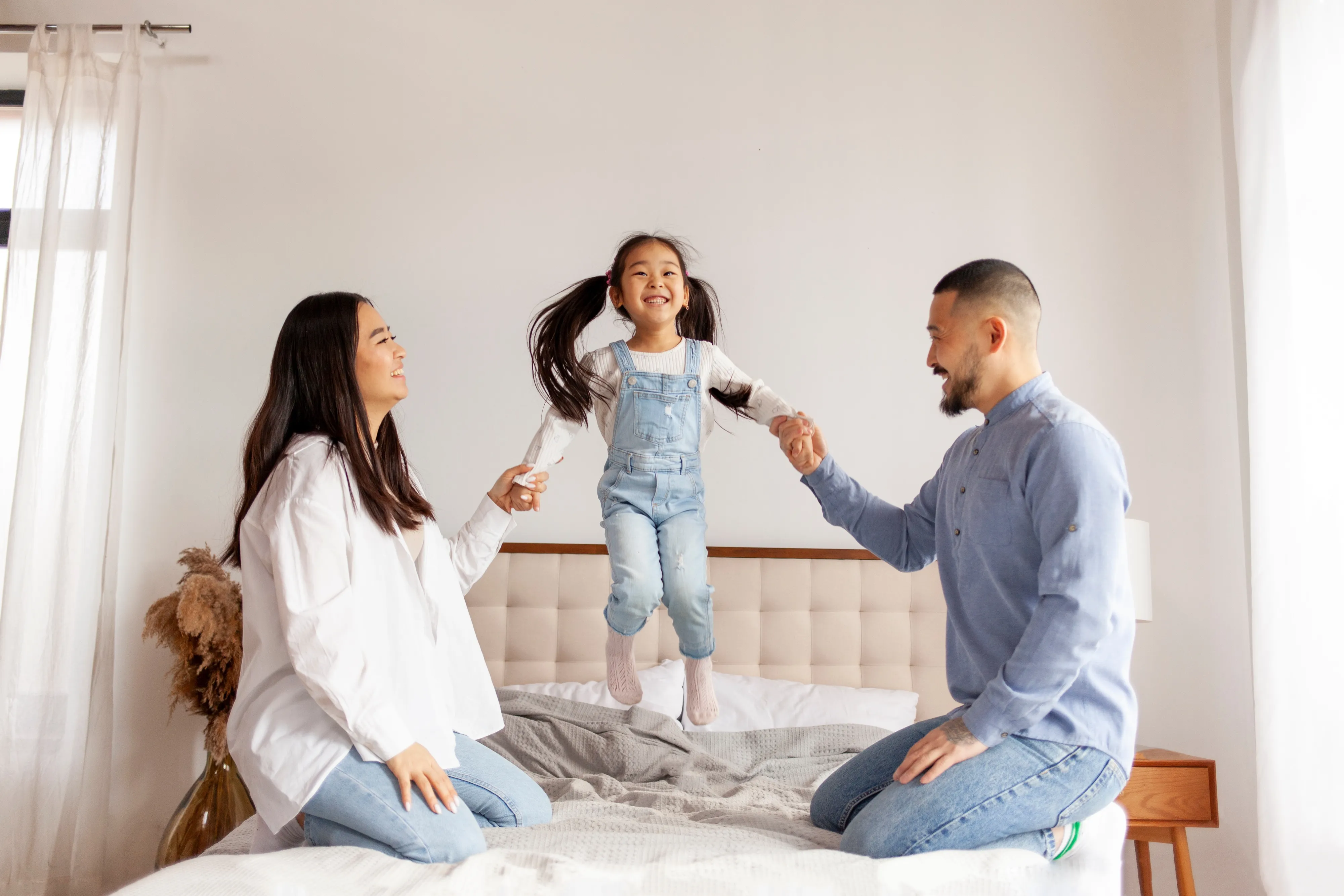 happy family in new bedroom in Bixby, OK