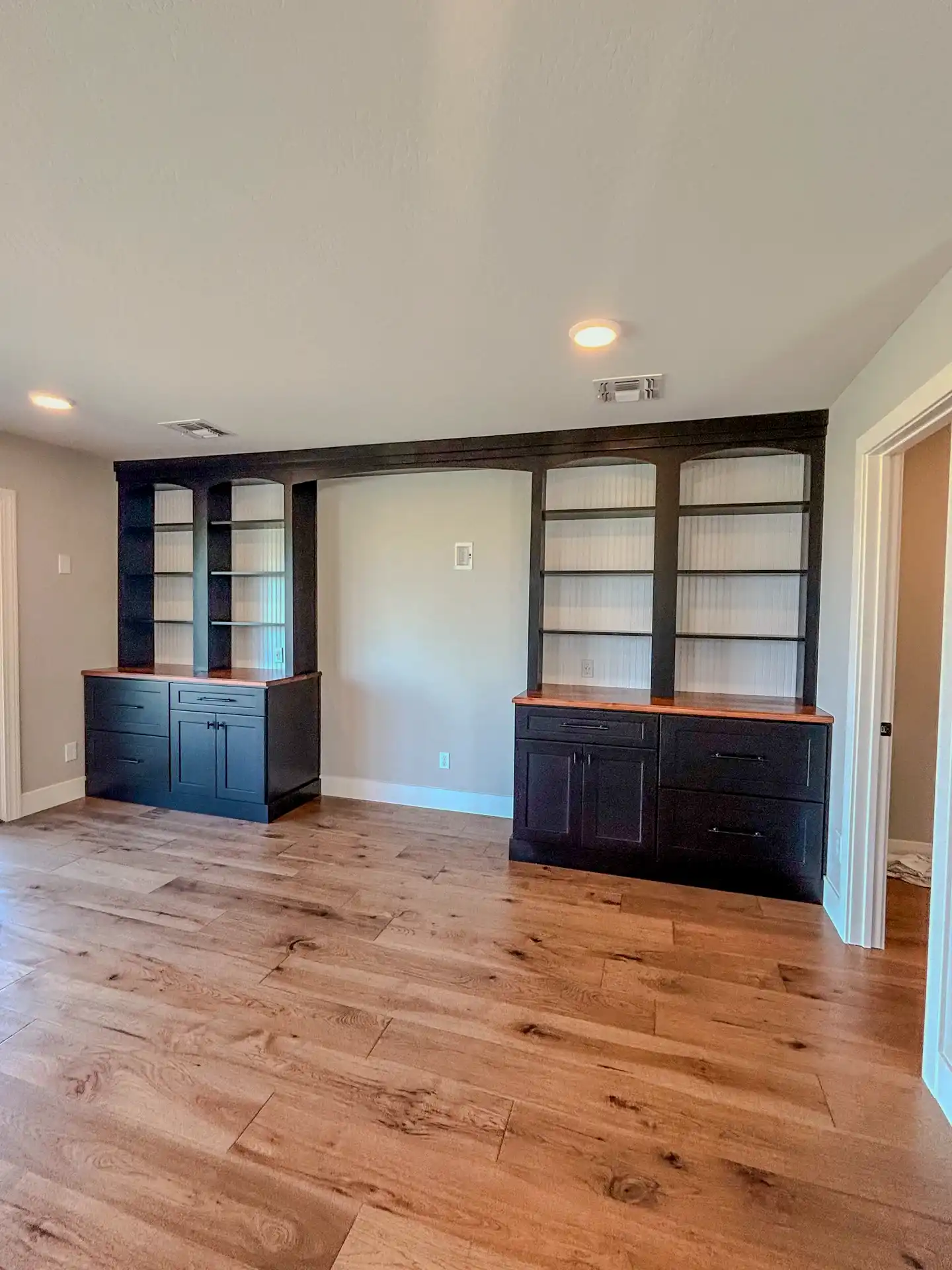 Picture of Cook project's loft area with bookshelf fixture.