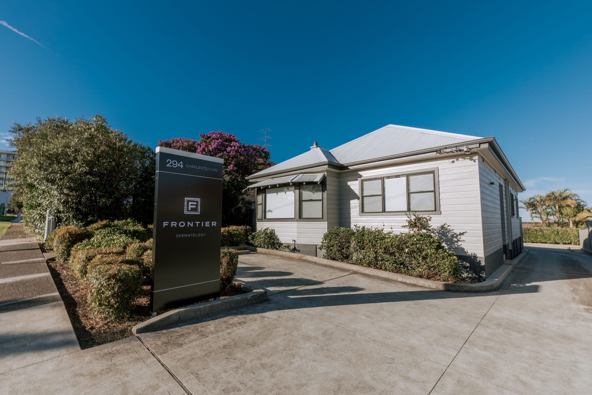 Line up of 4 Mesoestetic skincare products, including Dermamelan and moisturising solutions