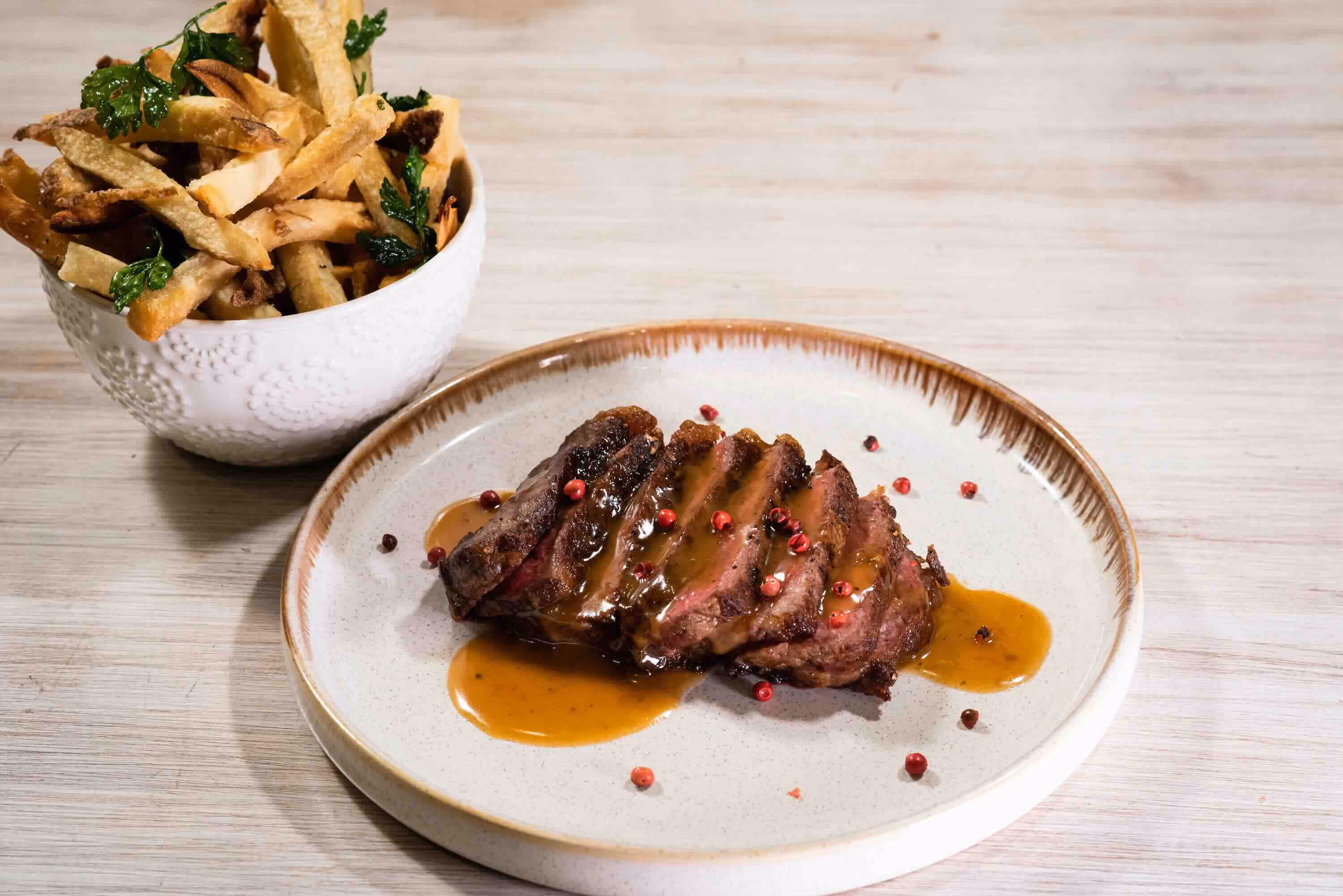 Steak frites from our in-house catering team. Focusing on fresh, ingredient driven cuisine 
