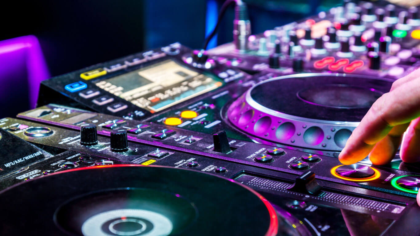 a dj mixing a track with his hands