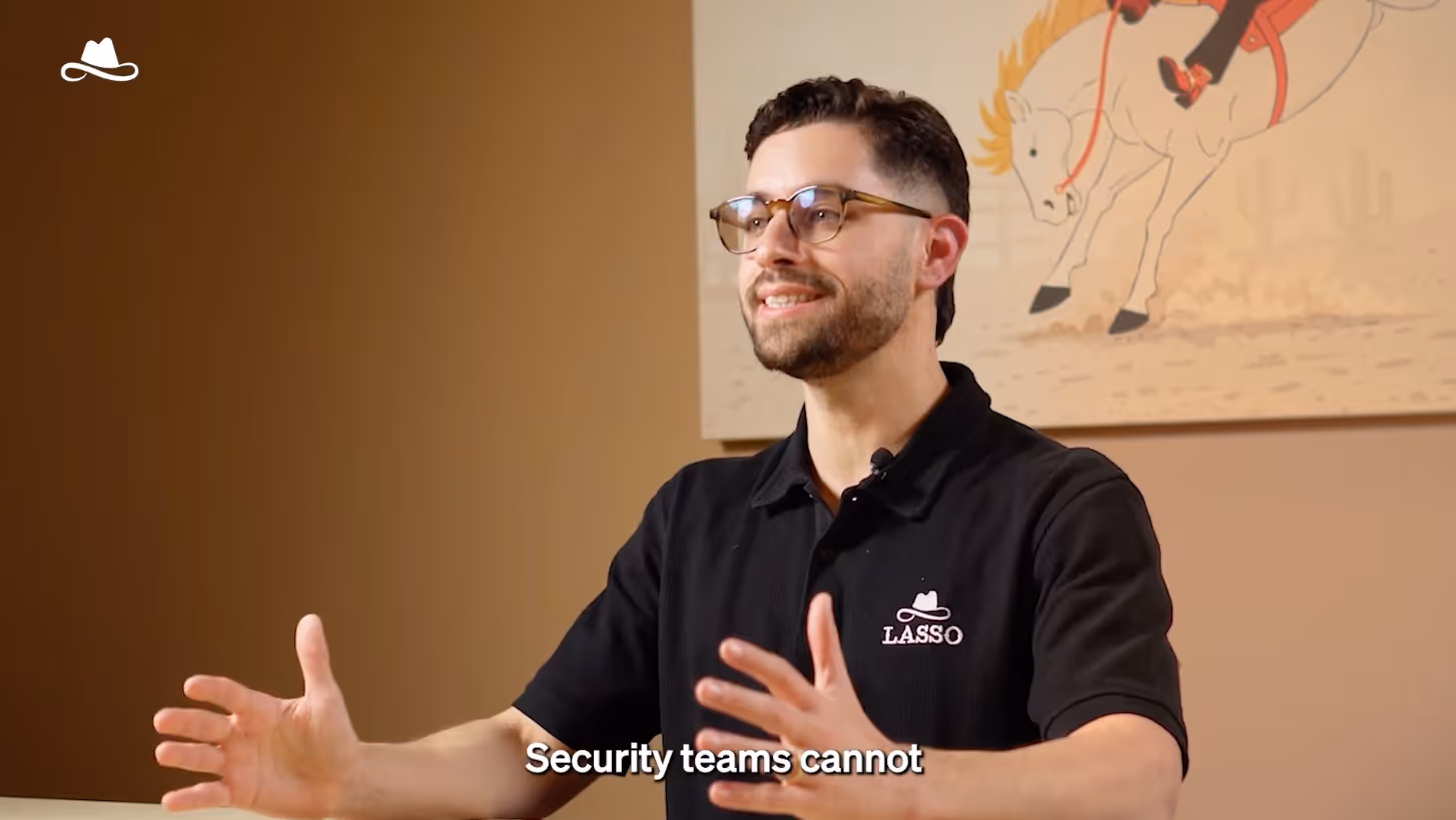 A man in a black shirt is talking.