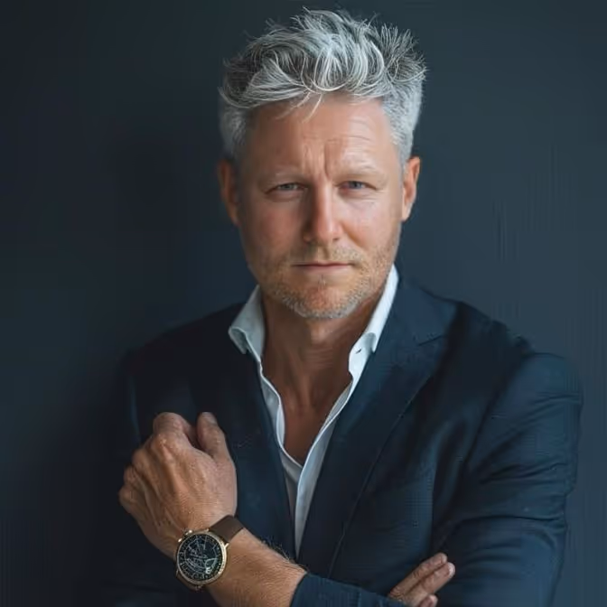 A professional photo of Nick Tyler, Managing Director of The Omega Group
