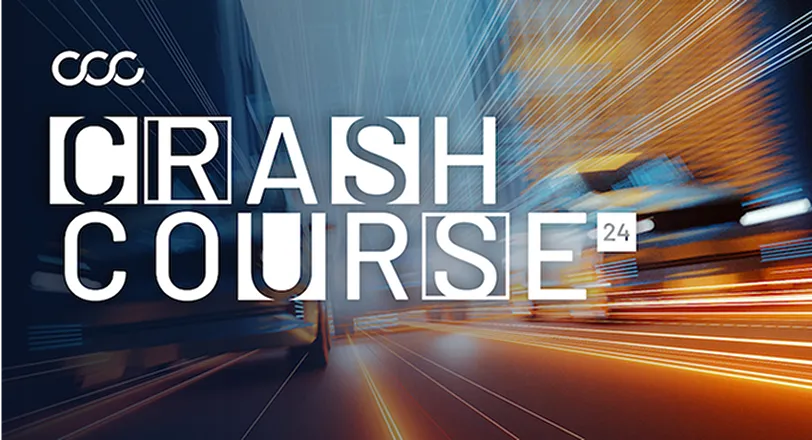 A blurry photo of a city street with the words crash course.