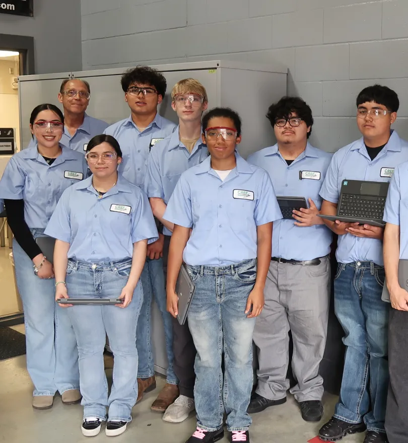 A tall building with a tree in front of it.