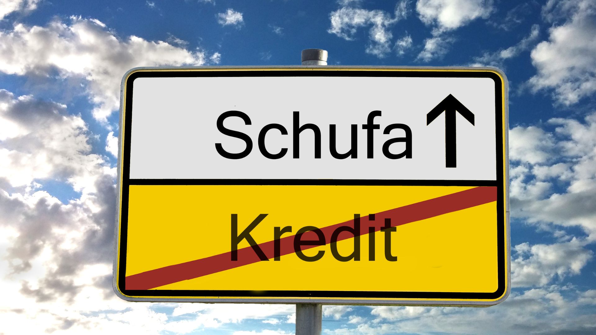 Ortsschild mit der Aufschrift ‚Schufa‘ und durchgestrichenem ‚Kredit‘