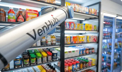 inside venhub showing robot arm with venhub logo