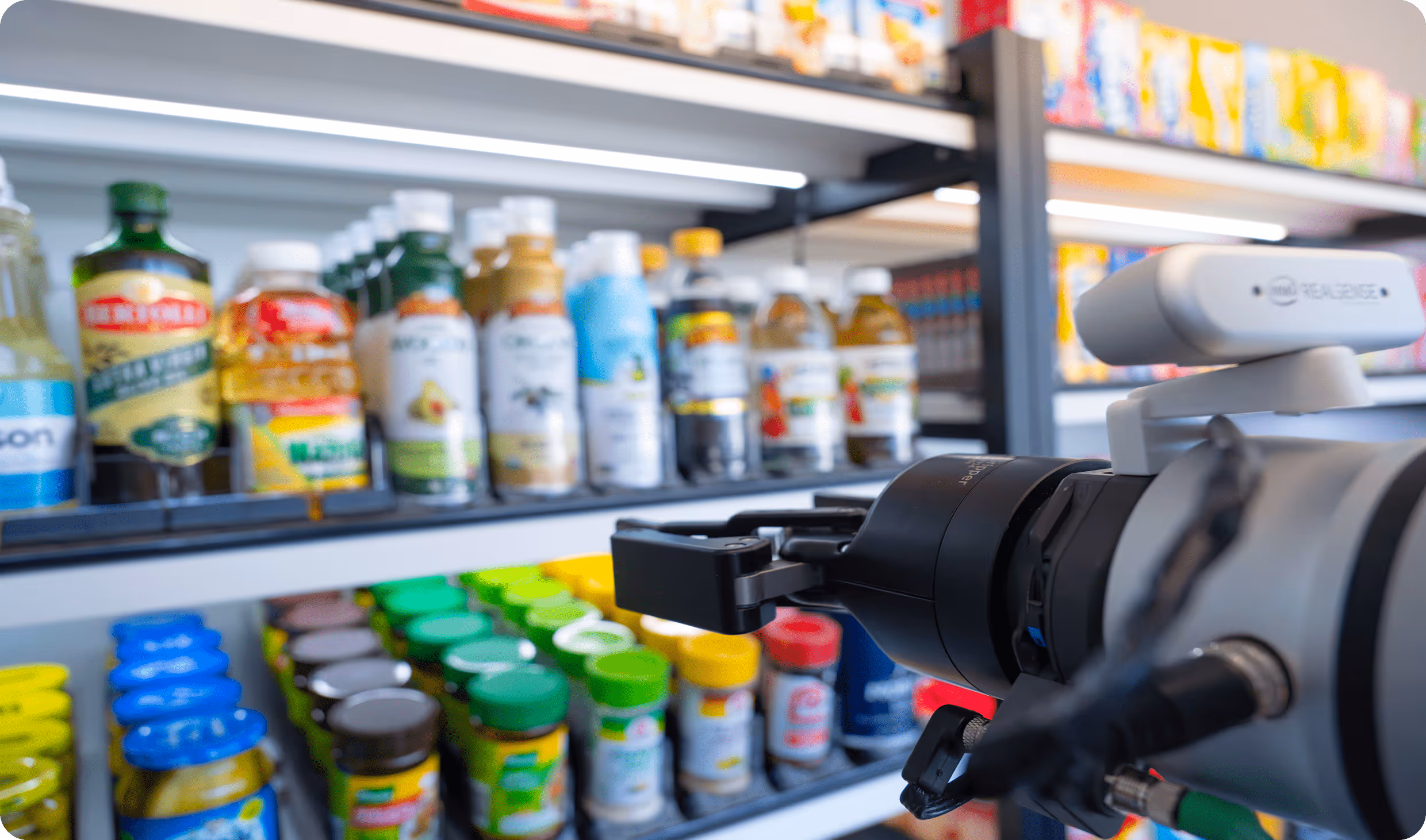 Inside venhub smart store showing robot arm and camera