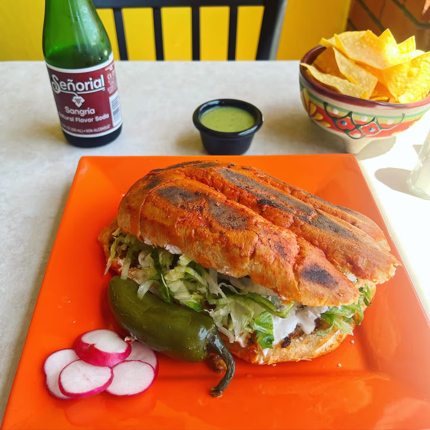 A pambazo on a plate