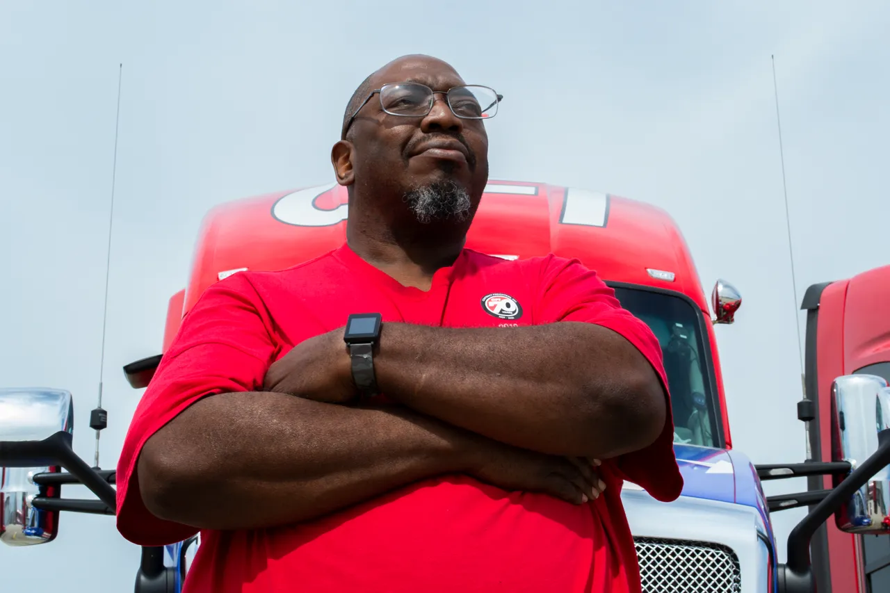 Picture of a driver and their truck
