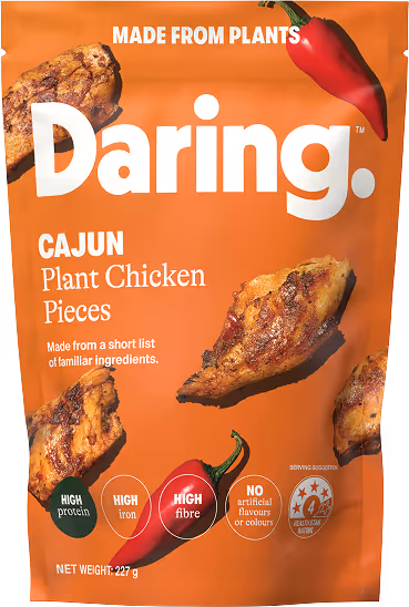 Orange package of Daring Cajun Plant Chicken Pieces with images of chicken pieces and a chili pepper.