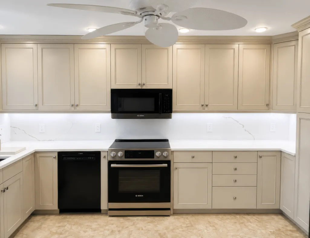 Expert kitchen cabinet refinishing that restores worn cabinets with a flawless, factory-quality finish.