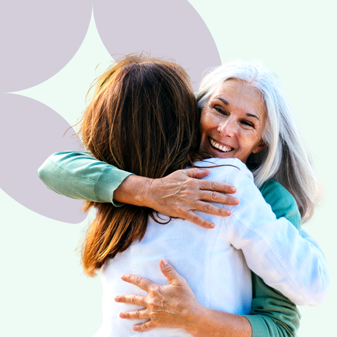 Mother and daughter hugging