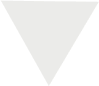 White downward-pointing equilateral triangle on a transparent background.