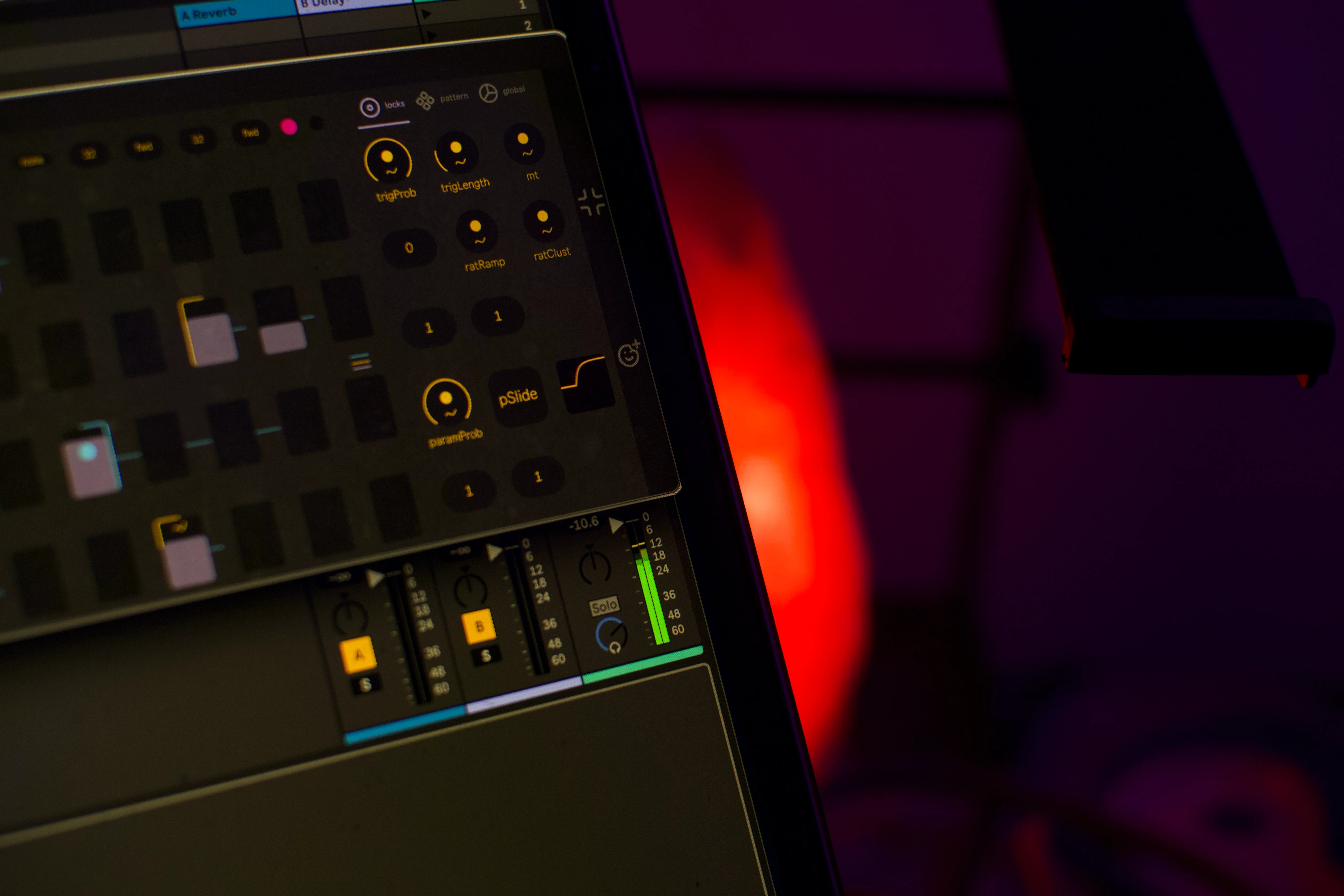 MNGLseq in a music studio with a close up of the advanced 64 step sequencer and the trig locks, parameter locks, sequencer directions and last step settings
