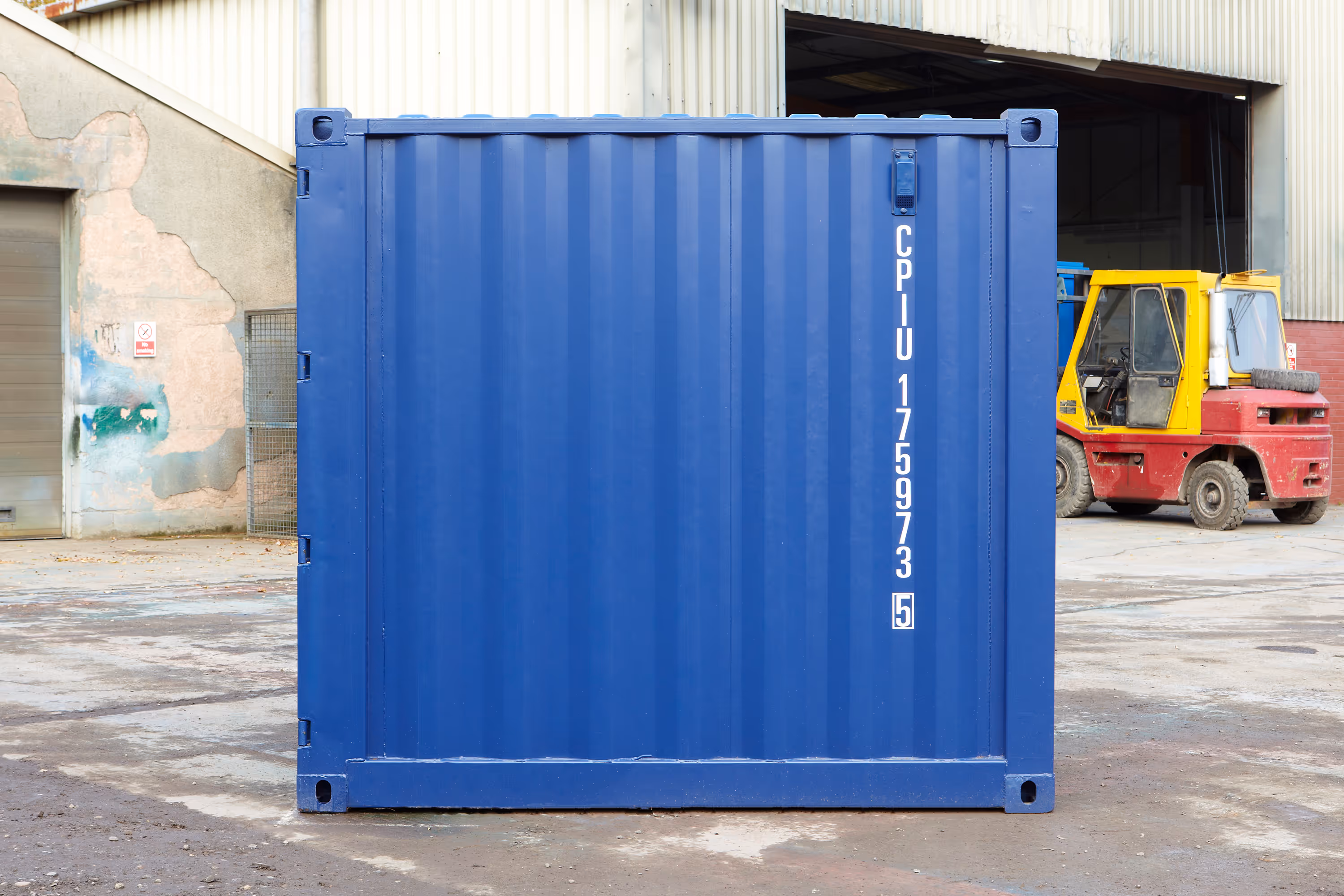 A blue shipping container with the number 5339 on it.