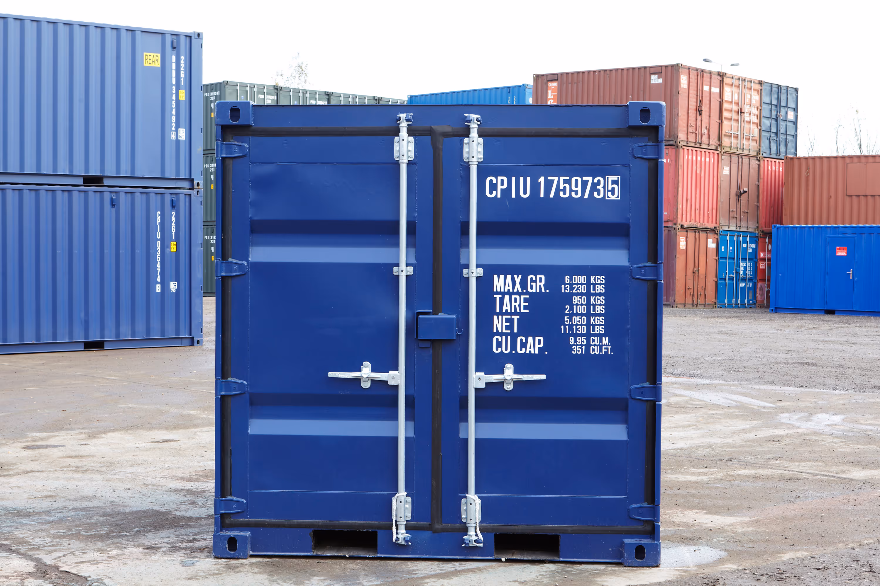A blue shipping container with the number 177955 on it.