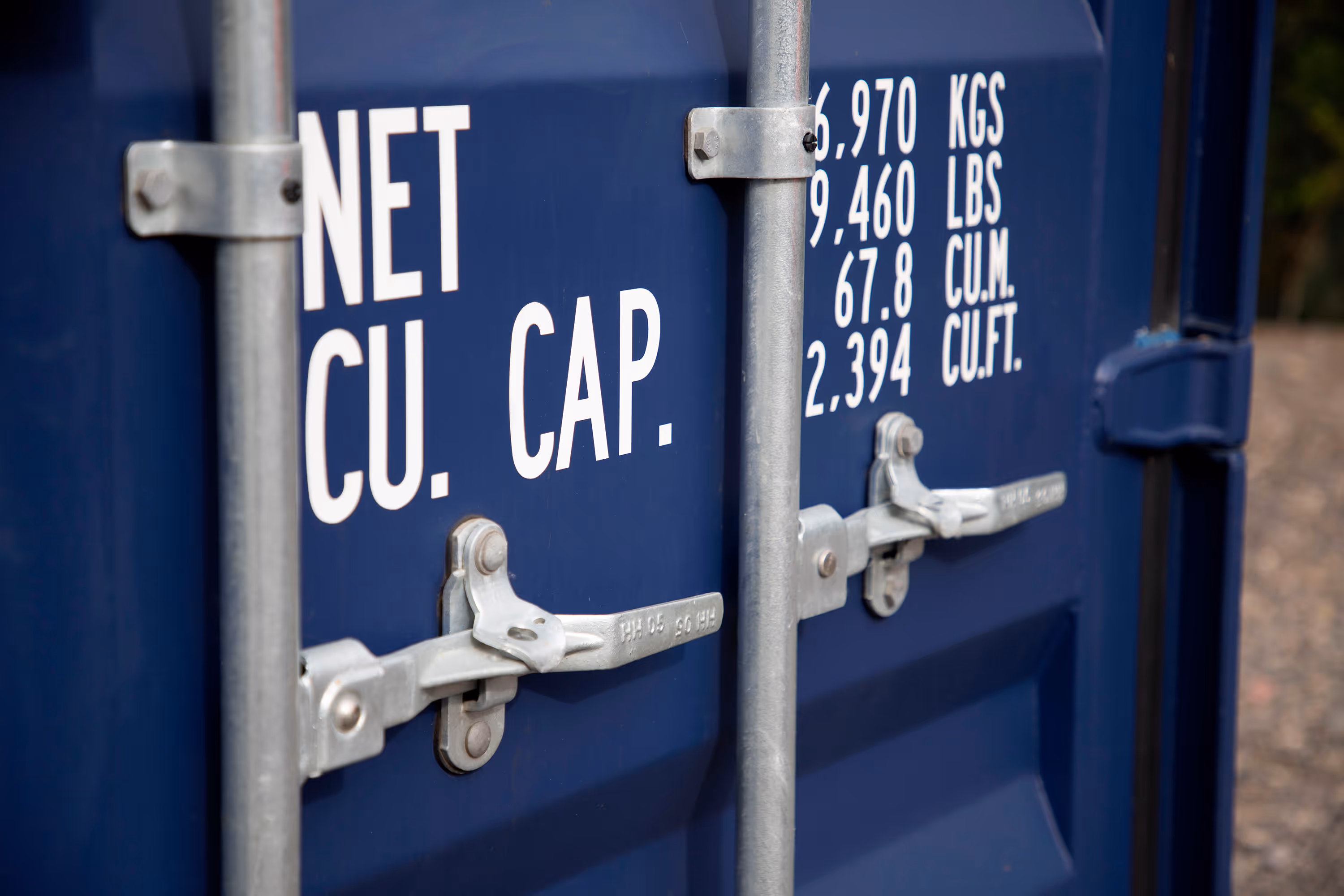 A blue container with the word CAP on it.