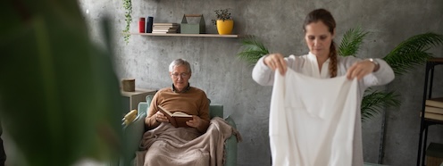 Adult child and aging parent together at home, reflecting the moment a family member notices that household tasks have started to become difficult to manage