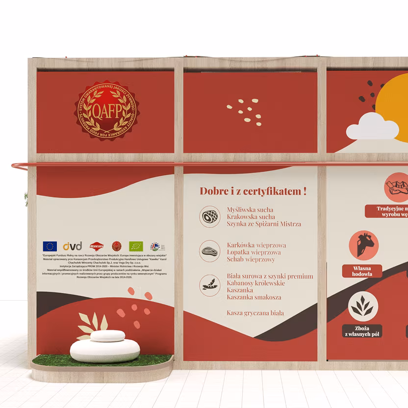 Stoisko z certyfikatami jakości i produktami mięsnymi na czerwonym tle.