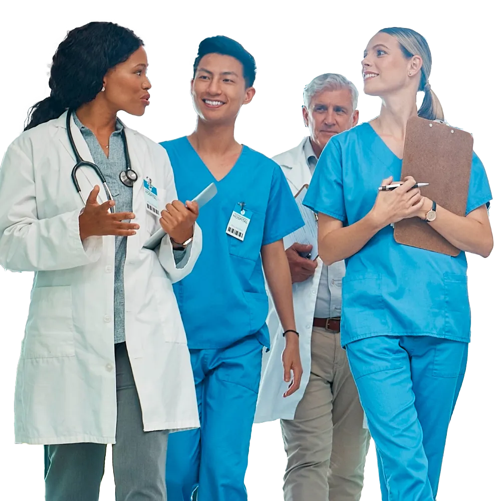 A team of doctors conversing as they walk through a healthcare facility.