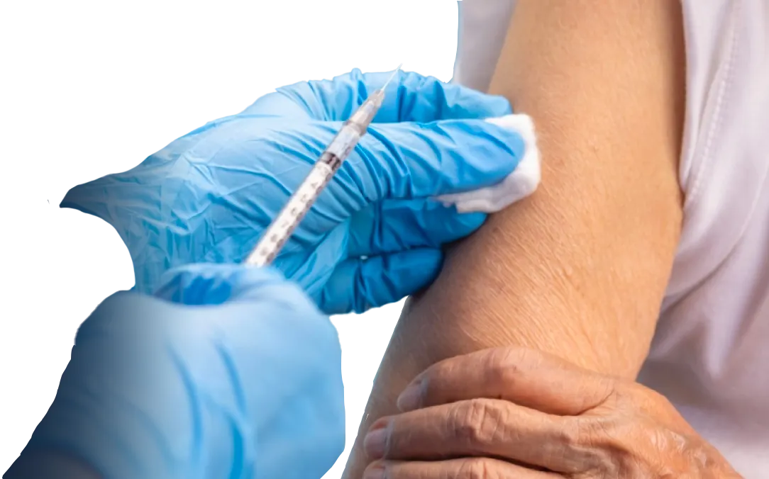 An arm positioned with a needle ready for an injection, illustrating the moment before the shot is administered.