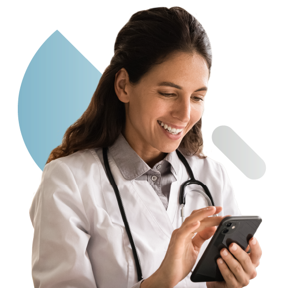 Smiling female doctor in a white coat with a stethoscope, using a smartphone