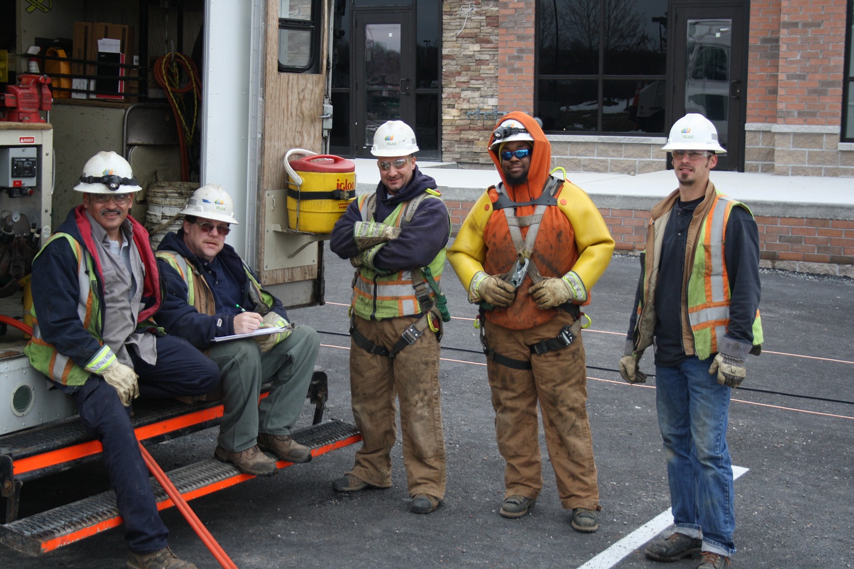 IBEW Local 36 workers on the job smiling