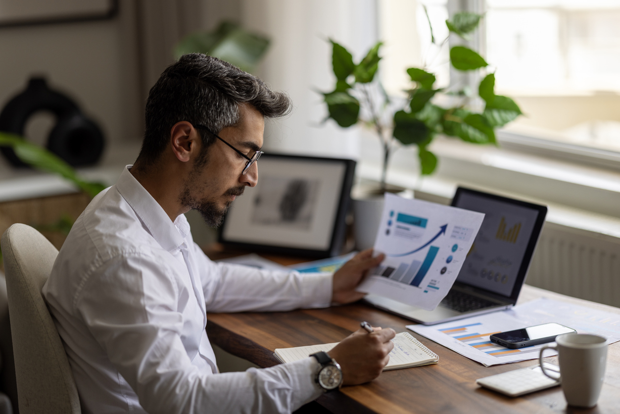A nonprofit team member conducts an independent, internal audit to check records for accuracy.