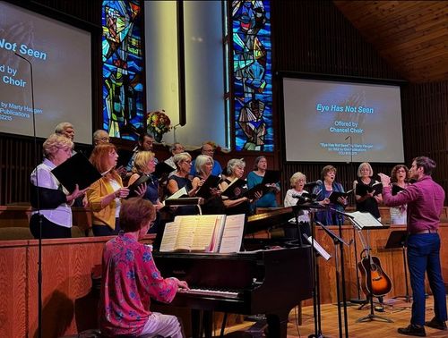 The Chancel Choir sings during a Sunday worship service.