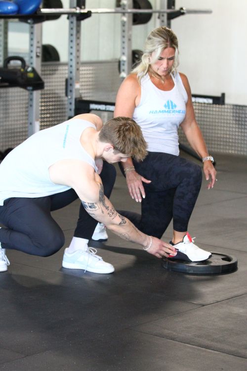 Photo of a client doing a lunge