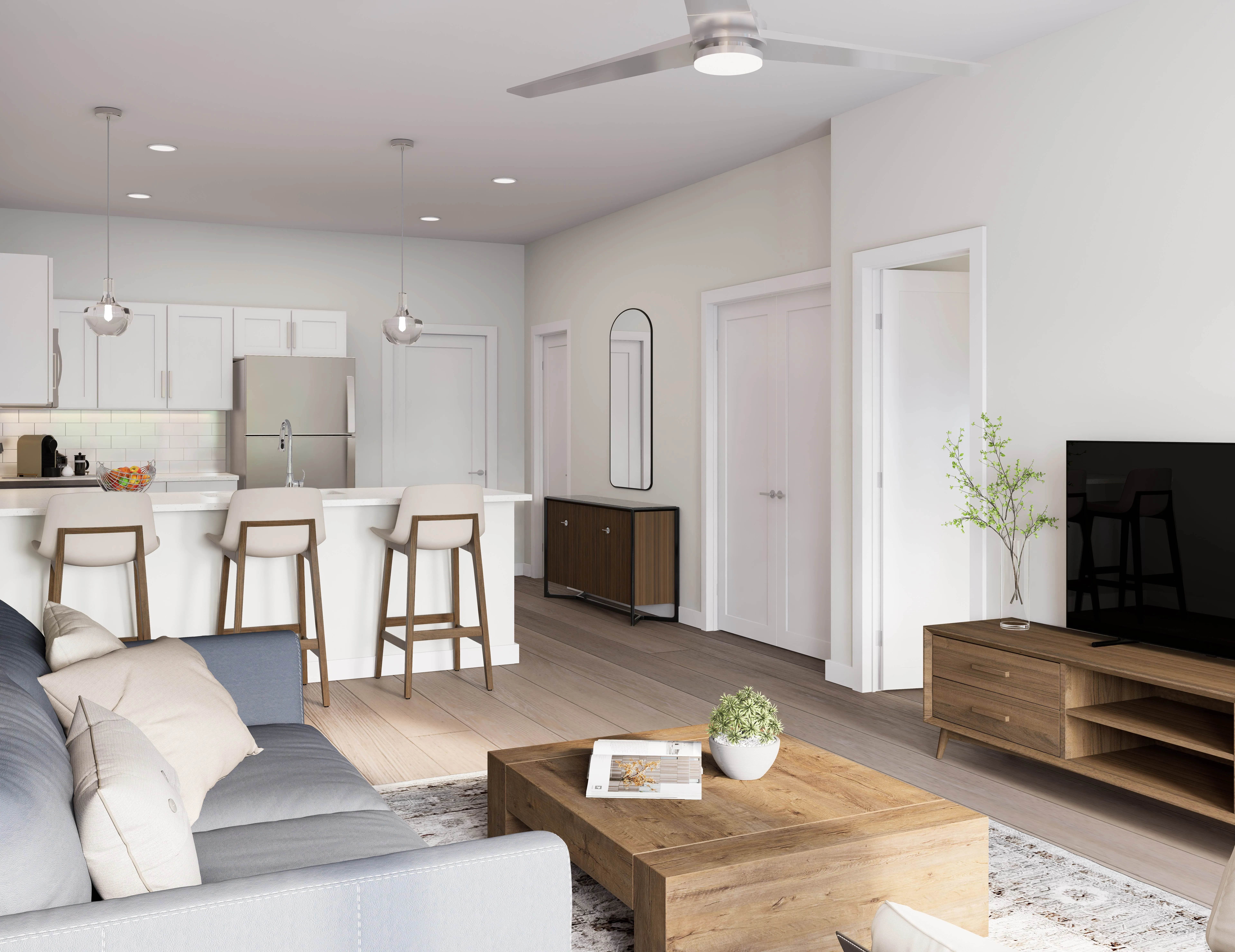 Virtual rendering of living and kitchen areas featuring staging furniture