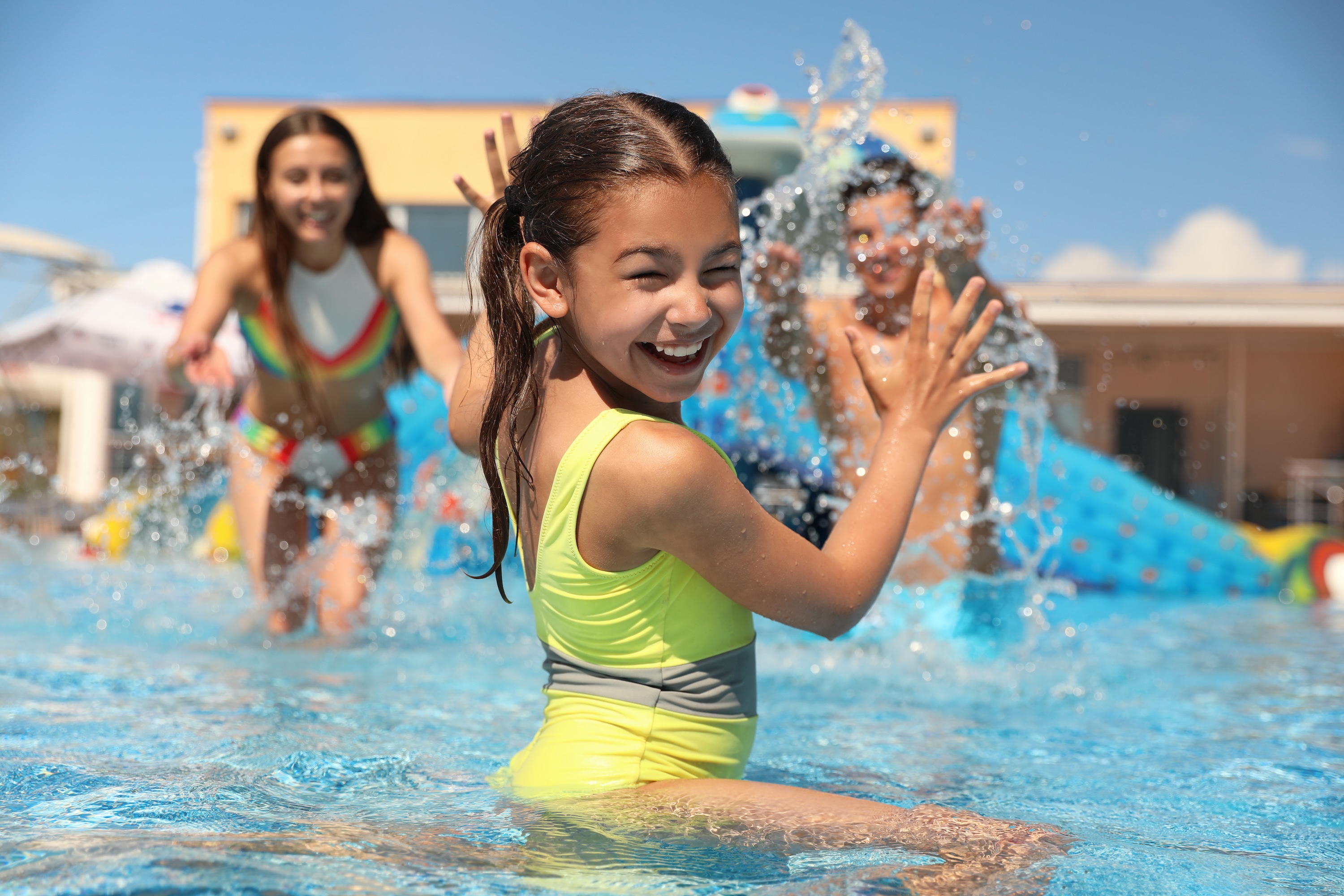 Children splashing and playing in the pool at Wildcat Vista, Godley