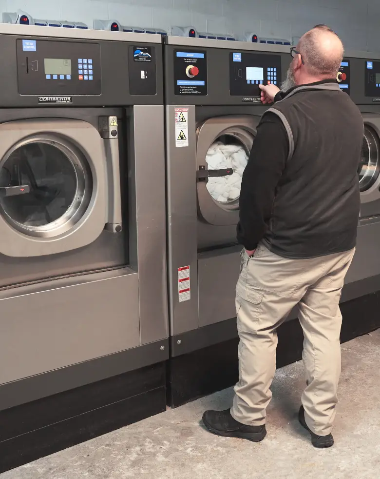 Close up image of a laundry machine