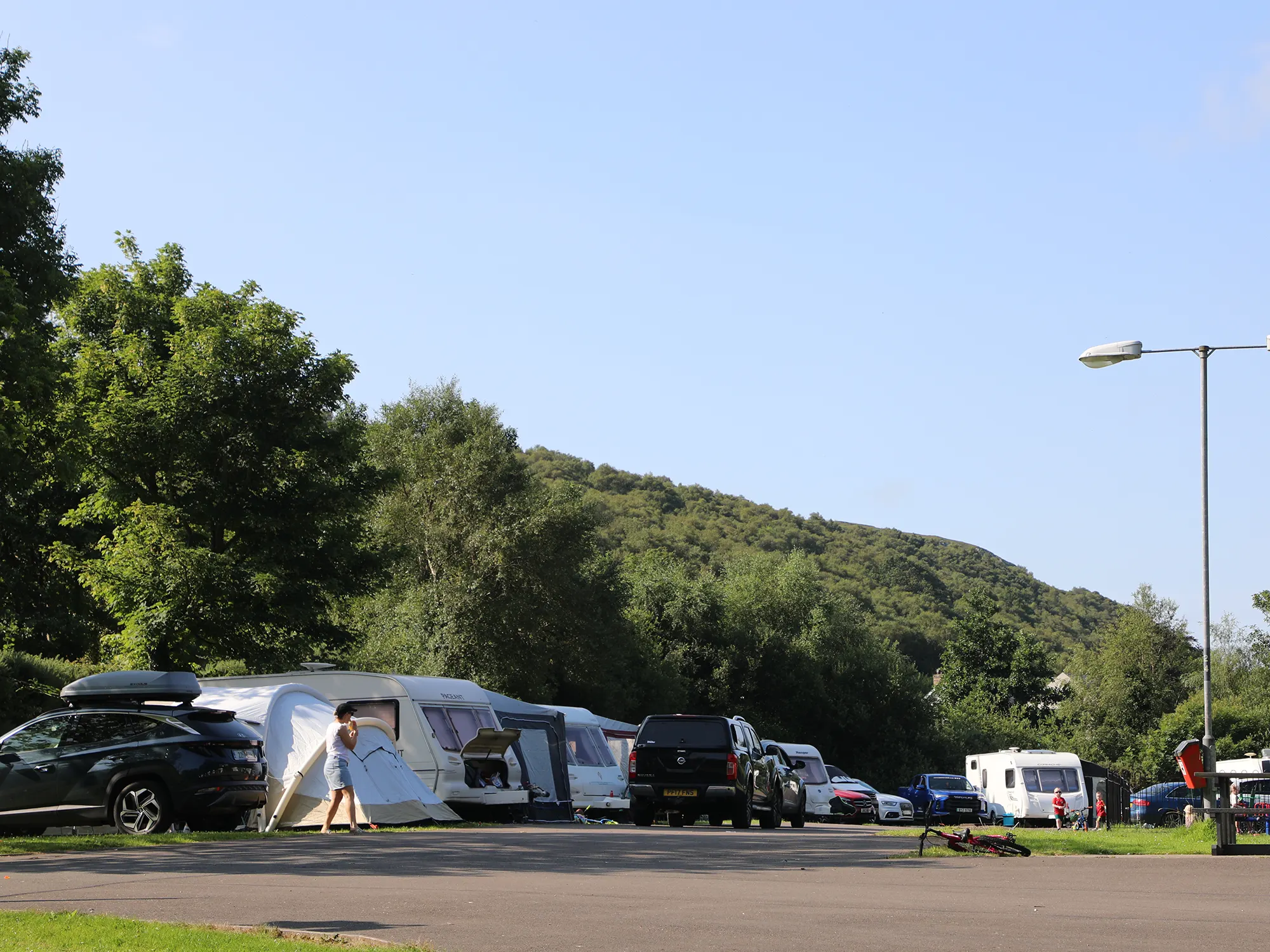 Grass camping pitches overlooking the Donegal countryside at Mulroy Bay Resort