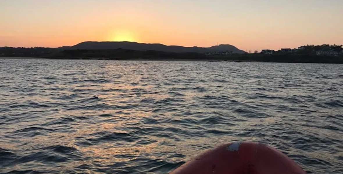 Sunset over Mulroy Bay viewed from the water
