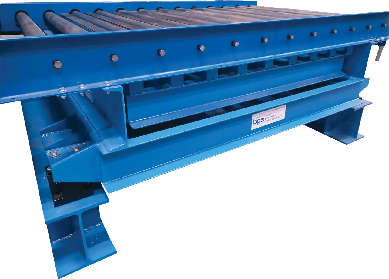 Grid Deck Vibratory Table Model VG Designed for High-Capacity Compaction with Roller Conveyor Integration