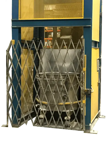 Drum Dumper with secured drum inside safety cage for controlled industrial material discharge